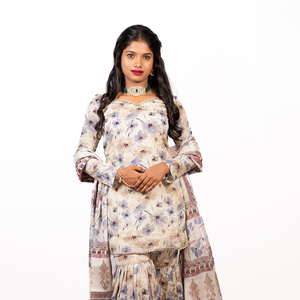 Floral Light Cream Chiffon Cross Kurta with Sharara and Dupatta, featuring glass work at the neck.